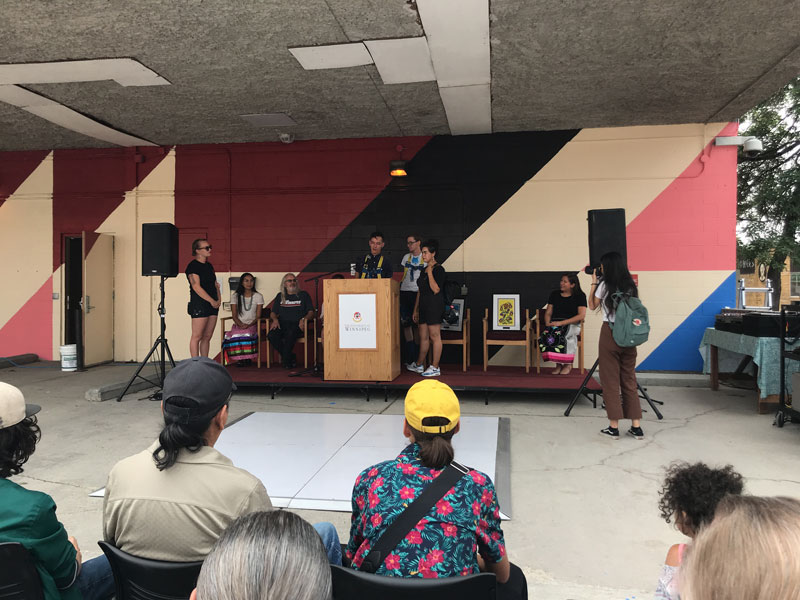Kenneth Lavallee speaks at mural unveiling
