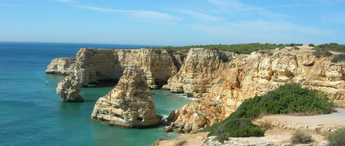 Algarve, Portugal.  Cliffs and water